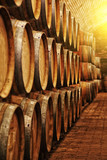 Fototapeta Kuchnia - Wine barrels in wine-vaults in order