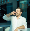 © alotofpeople - Business man enjoy talking on phone