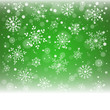 Christmas snowflakes and snowdrift on green background.