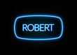 Robert  - colorful Neon Sign on brickwall