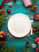 Christmas Dark Green Background With Empty Dish And Cutlery. Festive Holiday Dinner Concept