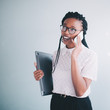 © Criene Images - African businesswoman in a conversation on the phone