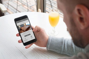 Poster - Man buy real estate property with mobile phone.