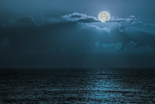 Blue Moon Light Reflecting Off Ocean. Romantic Twilight Moonlight