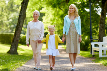 Canvas Print - happy mother, daughter and grandmother at park