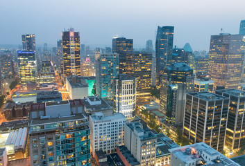 Wall Mural - Night aerial view of Vancouver skyscrapers from city rooftop - British Columbia, Canada