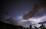 Fototapeta Abstrakcje - Stormy and cloudy night , thunder in the sky , lightning in clouds