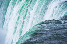Close Up View Of The Amazing Niagara Falls Seen From The Canadian Border In Autumn.