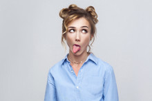 Emotional Blonde Girl Have A Crazy Face And Tongue Out