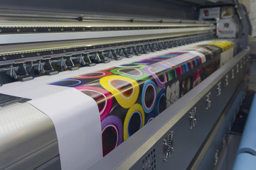 Large format printing machine in operation. Industry