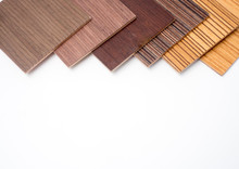 Samples Of Veneer Wood On White Background. Interior Design Select Material For Idea.Hand Holding Veneer Wood.