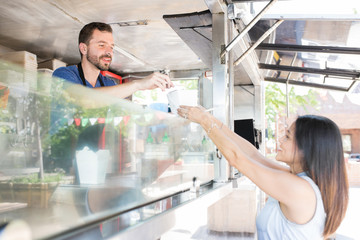 Wall Mural - Buying food in a food truck