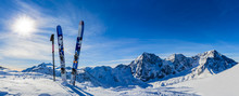 Ski In Winter Season, Mountains And Ski Touring Backcountry Equipments On The Top Of Snowy Mountains In Sunny Day. South Tirol, Solda In Italy.