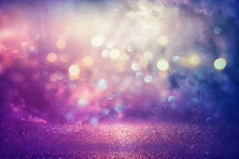 Purple Glitter Lights Background. Defocused.