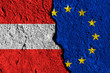 Crack between European union and Austria flags. political relationship concept