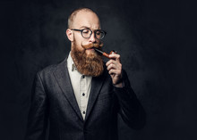 A Man Smoking Pipe Over Grey Background.