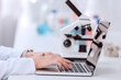 © LIGHTFIELD STUDIOS - Scientist using laptop