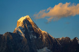 Fototapeta Góry - Beautiful four mountain (Siguniugn) capped mountains against the sunset sky in China