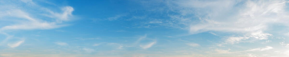 Vibrant color panoramic sky with cloud on a sunny day. Beautiful cirrus cloud. Panorama high resolution photograph.