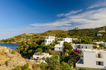 Wall Mural - Skala is a traditional Greek village on the coast with a castle on top of a hill, Patmos island, Dodecanese, Greece