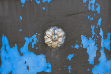 Texture Of The Painted Metal With Ornaments. Blue Flaking Paint. Background.