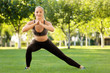 © Africa Studio - Sporty young woman exercising in park
