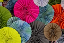 Recycled Paper Folding Umbrella, With Multi Color, Are Decorated As Background Or Backdrop.