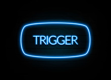 Trigger  - Colorful Neon Sign On Brickwall