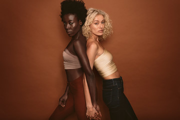Wall Mural - two young women with diverse ethnicity