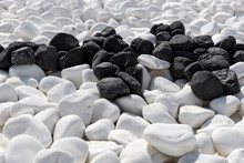 Many White And Black Round Stones As Background