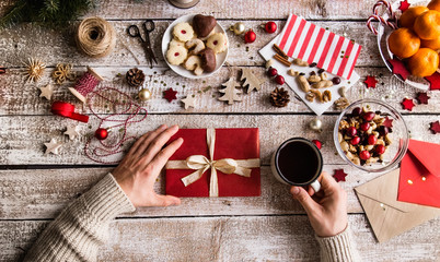 Wall Mural - Christmas composition on a wooden background.