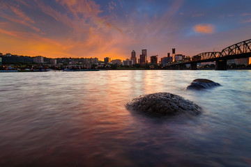 Wall Mural - Portland OR city Skyline along Willamette River at Sunset in Oregon USA America