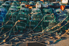 Lobster Fishing Cages On The Shore Of A Fishing Harbour