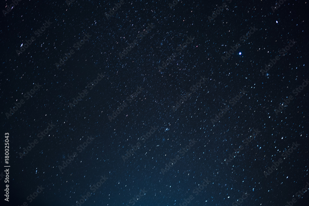 Night scape with beautiful stary sky at the high mountain. Star texture. Space background. - obrazy, fototapety, plakaty 