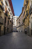 Fototapeta Uliczki - A Typical Narrow Street in Madrid Spain