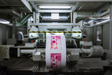 Fototapeta Miasto - Flexography Roll Material Printed Sheets Cylinder Production Industrial Magenta Rollers Printer Industry Commercial Heavy Flourescent Lights Machine