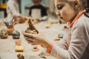 Wall Mural - children's hands sculpts