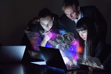 Group of people and futuristic GUI.