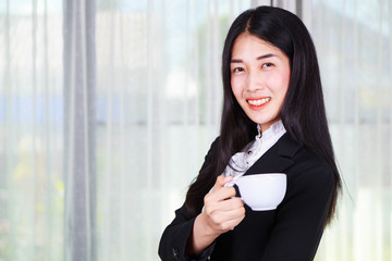 Sticker - business woman in suit with coffee or tea cup