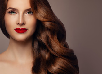 Wall Mural - Beautiful Redhead Woman Fashion Model with Perfect Wavy Hairstyle and Makeup, Pretty Female Face Closeup