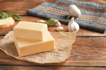 Wall Mural - Cut block of butter on table