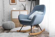 Living Room Interior With Grey Rocking Chair And Pillow