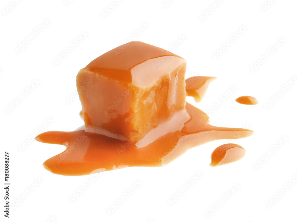 Sweet candy with caramel topping on white background