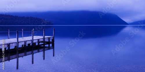 Fotomural Tranquil peaceful lake with jetty, New Zealand.