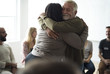 © Rawpixel.com - Senior man hugging woman in support group