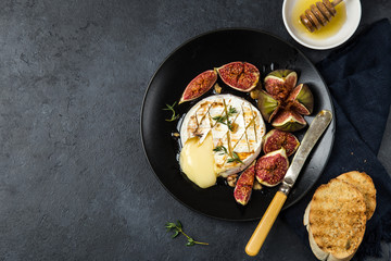 camembert cheese baked with  figs, nuts and honey