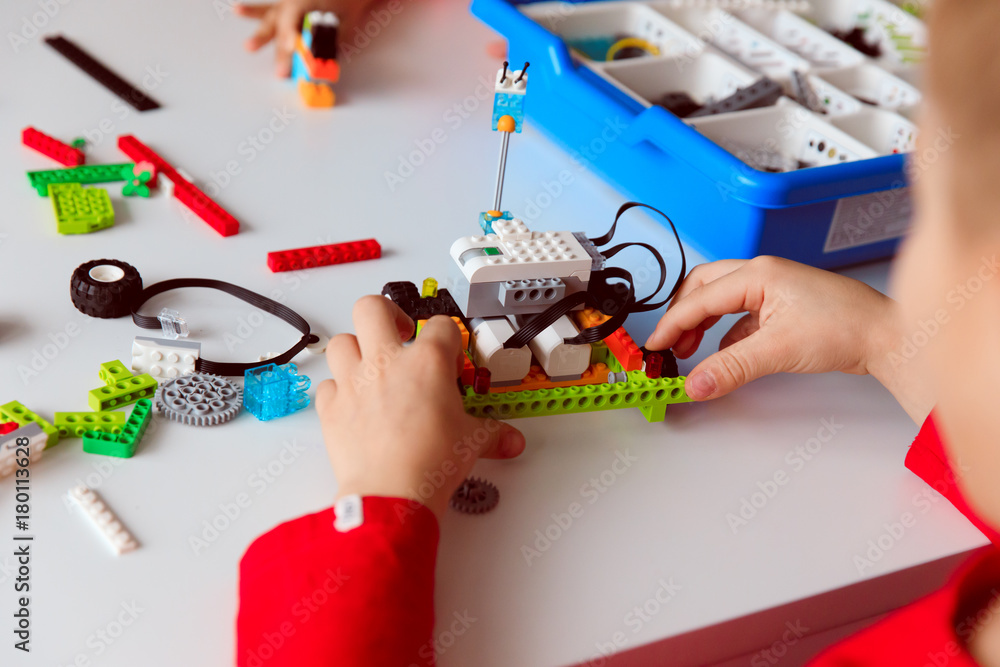 kids building robot at robotic technology school lesson Stock Photo ...
