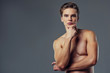 © Vasyl - Handsome man on grey background