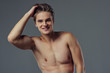 © Vasyl - Handsome man on grey background