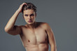 © Vasyl - Handsome man on grey background